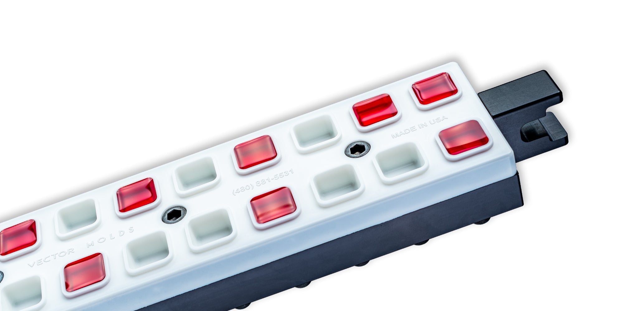 Premium industrial food-grade silicone manufacturing molds integrated with a high-speed automated extraction machine and mechanical ejector systems in a commercial confectionery copacking facility.