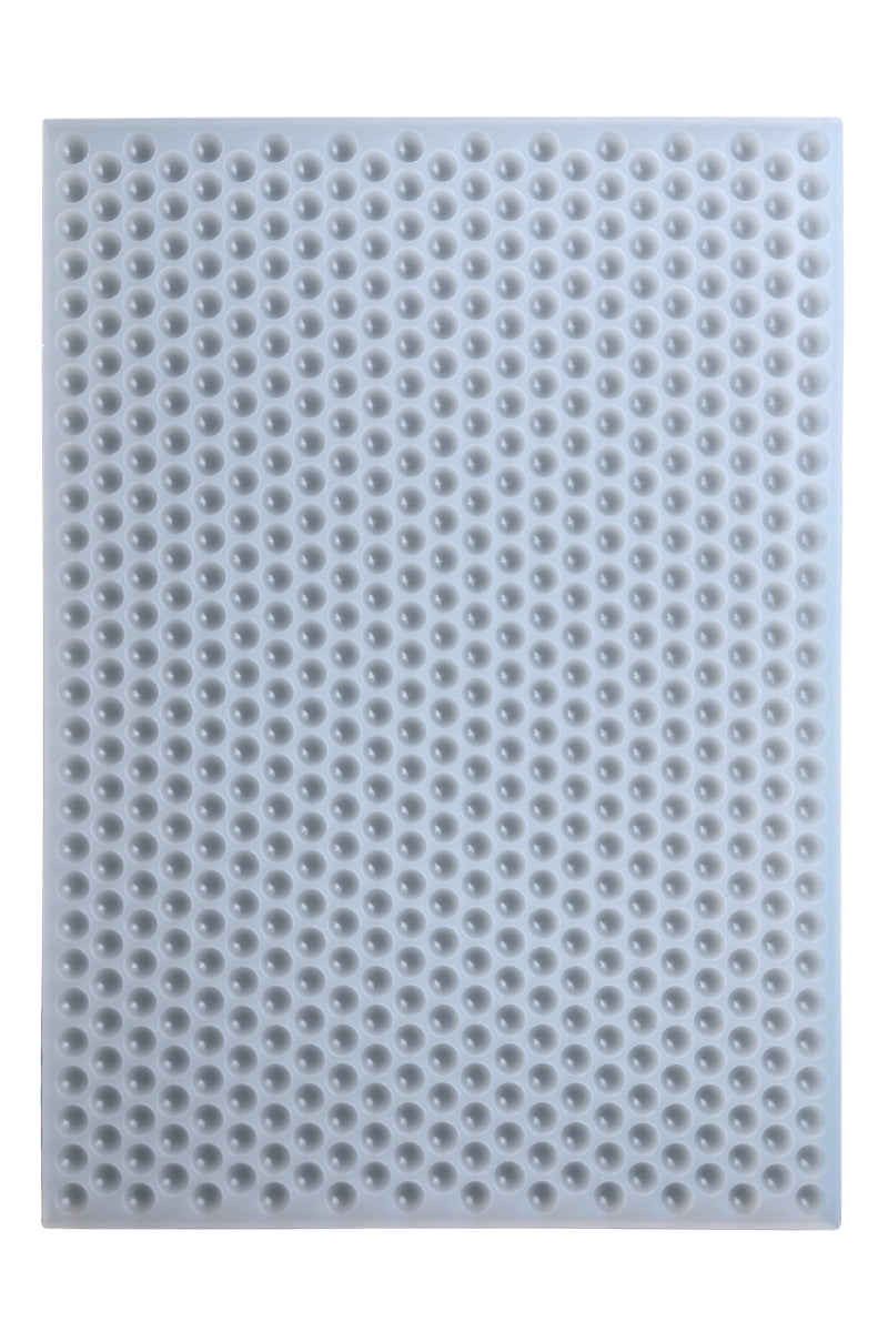 Platinum silicone mold with multiple round 0.5ml bon bon cavities, designed for candy, gummy, & chocolate.
