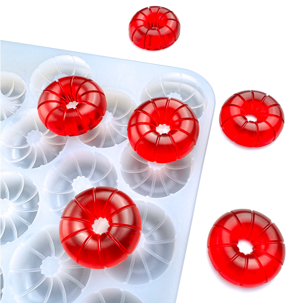 Custom food-grade silicone doughnut multidose gummy mold, 10ml ring-shaped cavities, 1ml per cut piece, with grooved detailing, shown with red gummies, compatible for hand pour