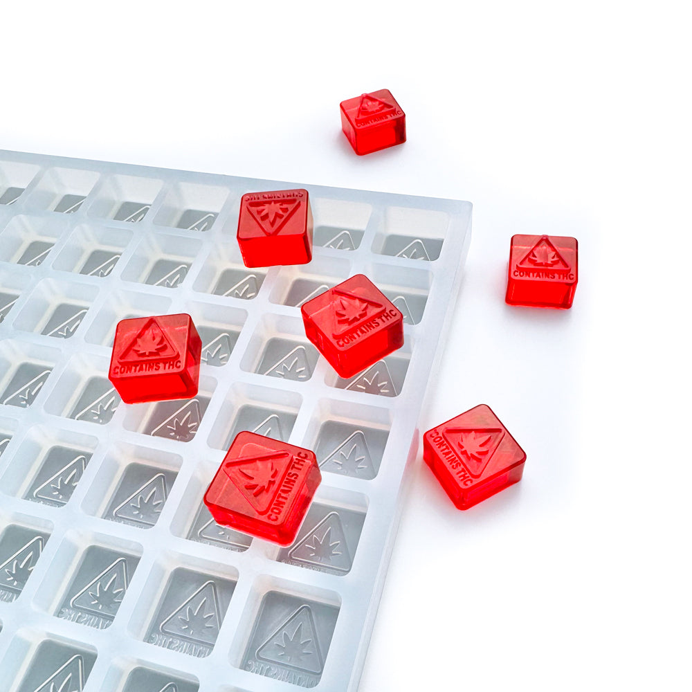 3.2mL Massachusetts, Maine, Rhode Island State Compliance Logo Square Gummy Mold Half Sheet. Food grade silicone mold for making gummies or candies with state compliance symbols. Two molds fit perfectly in an industrial sheet pan.