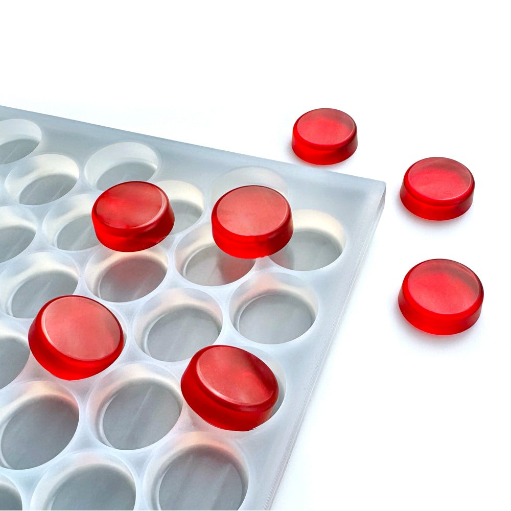 Custom food-grade silicone disk gummy mold, 3ml round flat-top cavities with smooth finish, shown with red gummies compatible with flood & scrape and hand pour