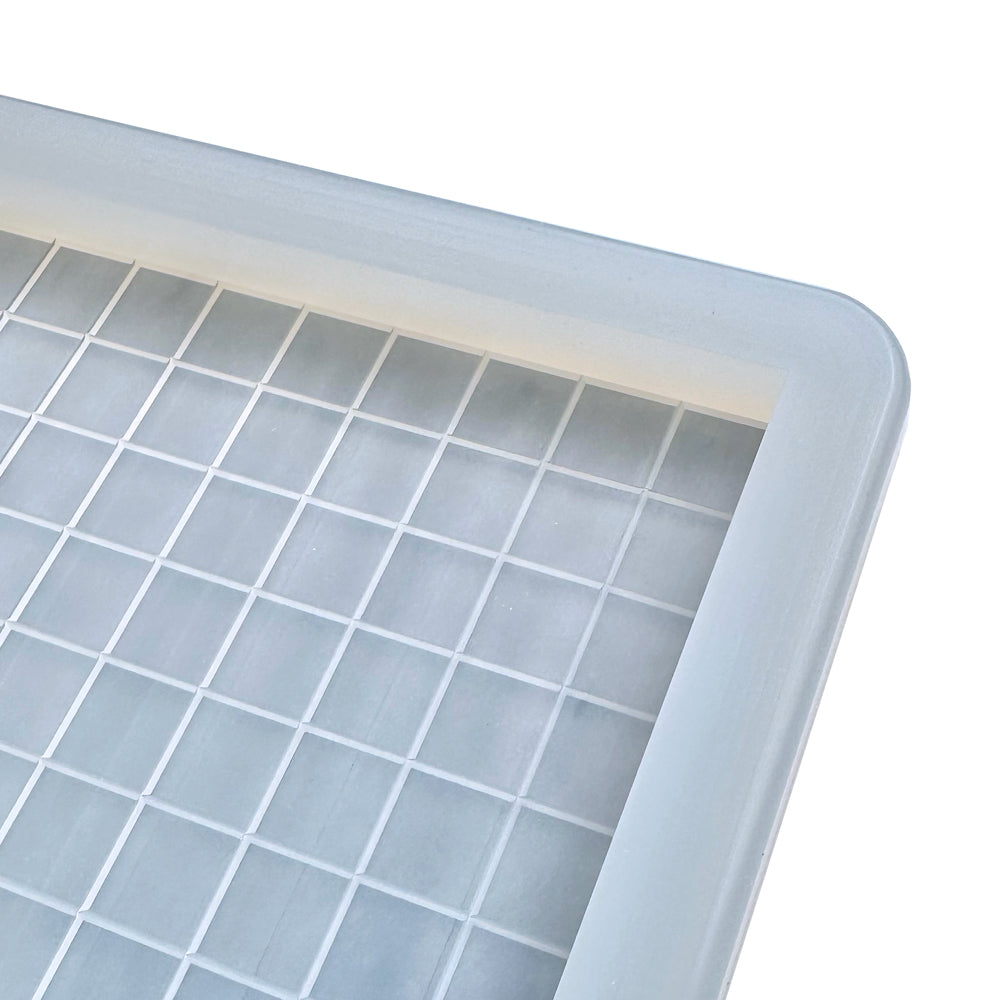 Close-up of the Vector Molds 3 mL Square Gummy Slab Mold, Half Sheet with 1 large cavity for 450 candies, featuring a food-grade silicone square grid pattern, photographed against a white background.