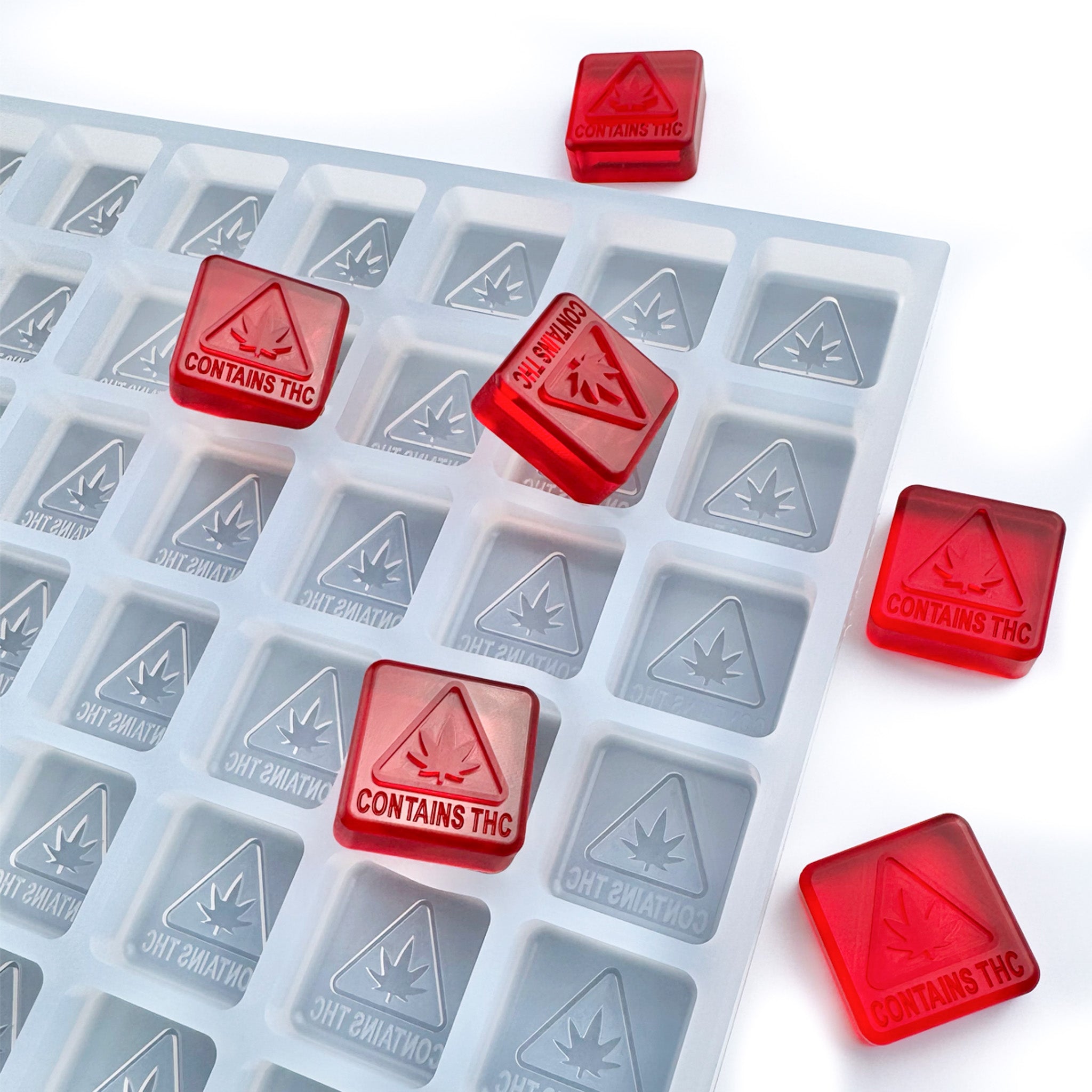 Main image of the 6.3 mL ME RI logo square silicone mold, designed for flood and scrape production with evenly filled cavities for gummies, chocolate, and confectionery.
