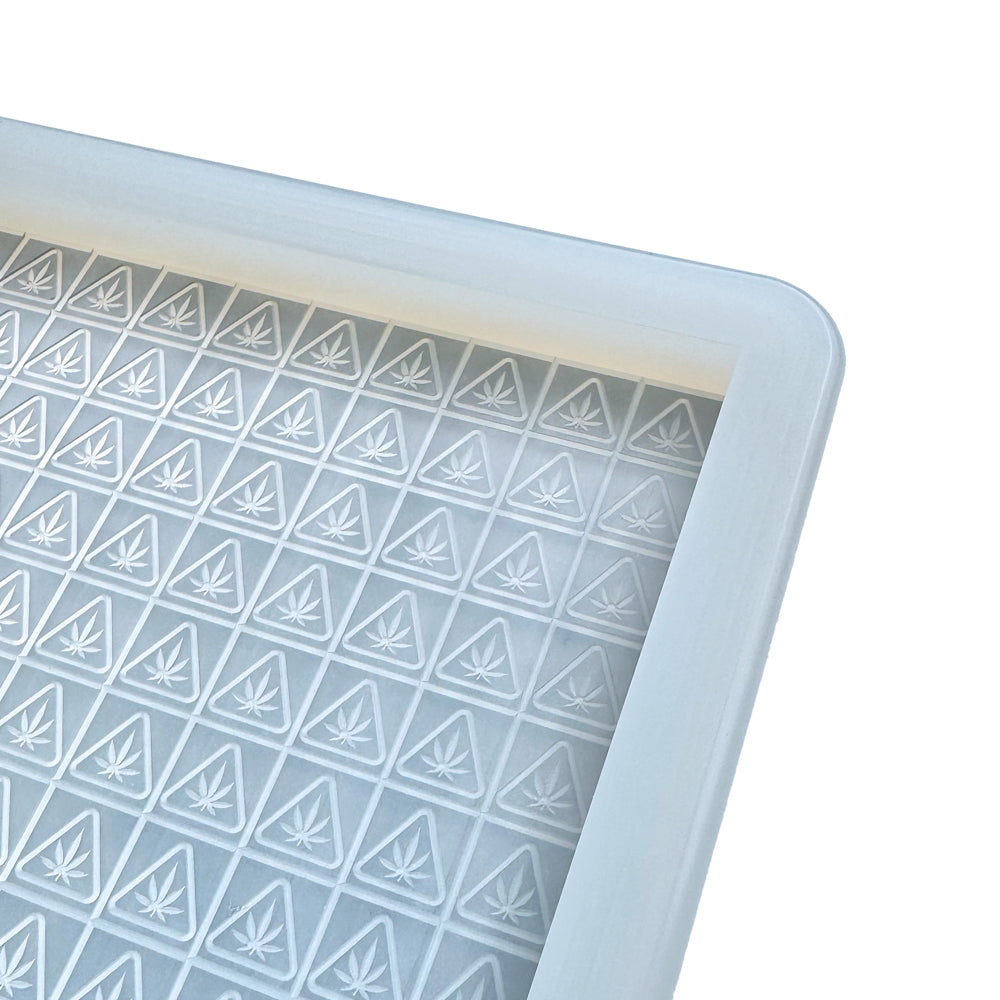 Close-up of the Vector Molds 3 mL Square Gummy Slab Mold, a half-sheet professional food-grade platinum silicone tray with a large cavity making 450 candies, featuring embossed NJ THC logo designs in each square.