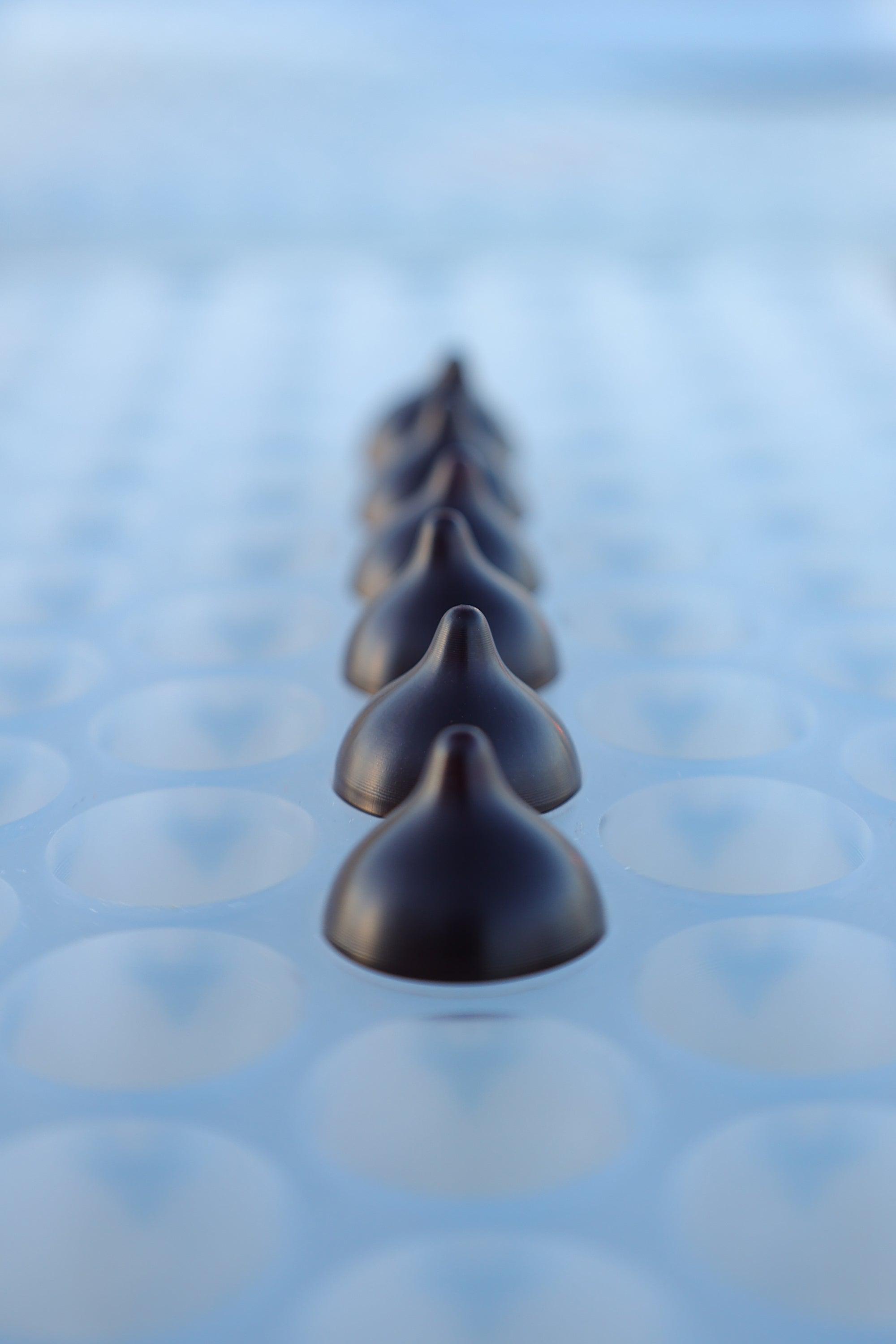 Close up profile of 2 mL Chocolate Drops silicone Quarter Sheet in a row - 130 Cavities