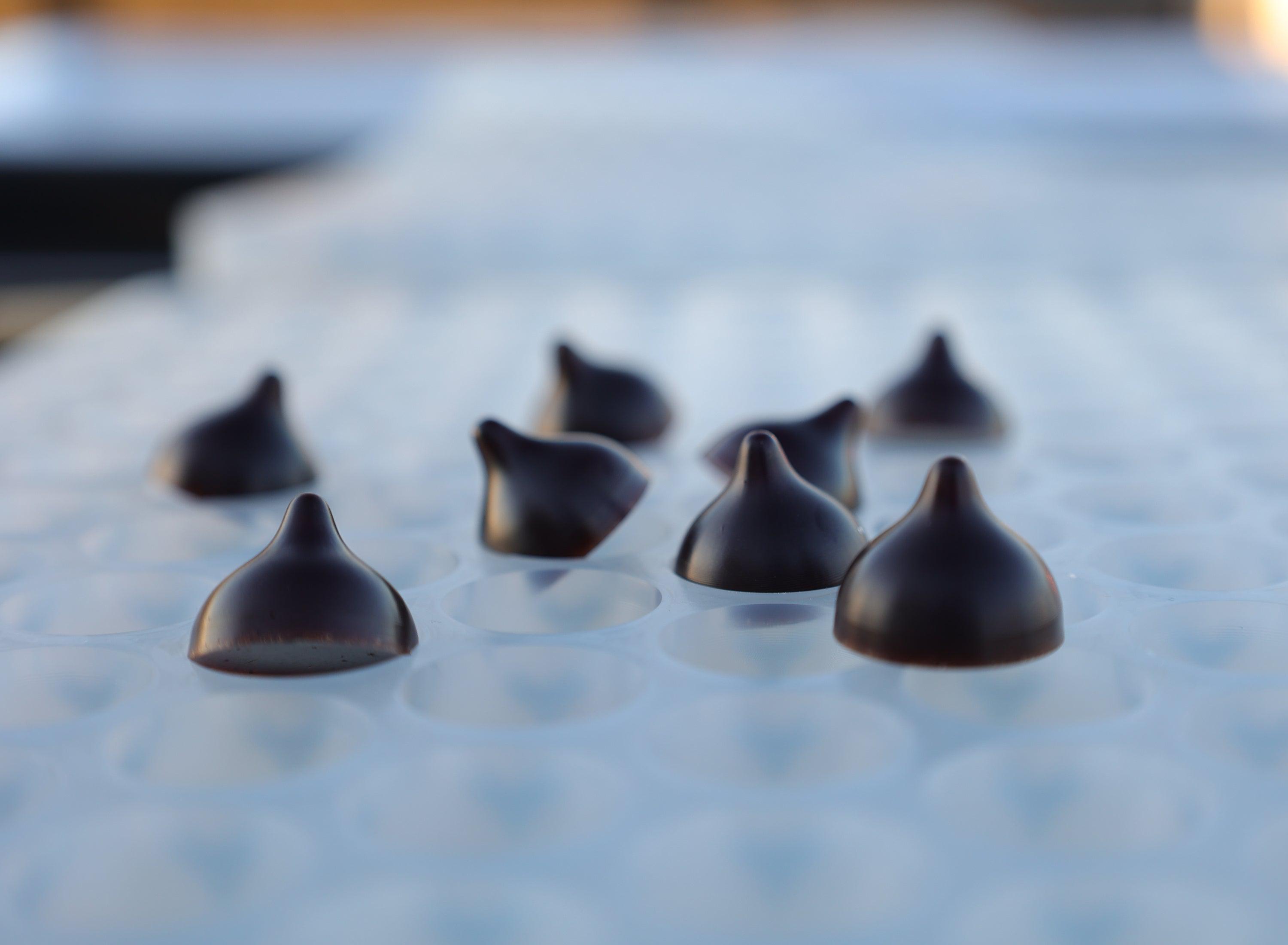 Close up profile of 2 mL Chocolate Drop silicone Quarter Sheet - 130 Cavities