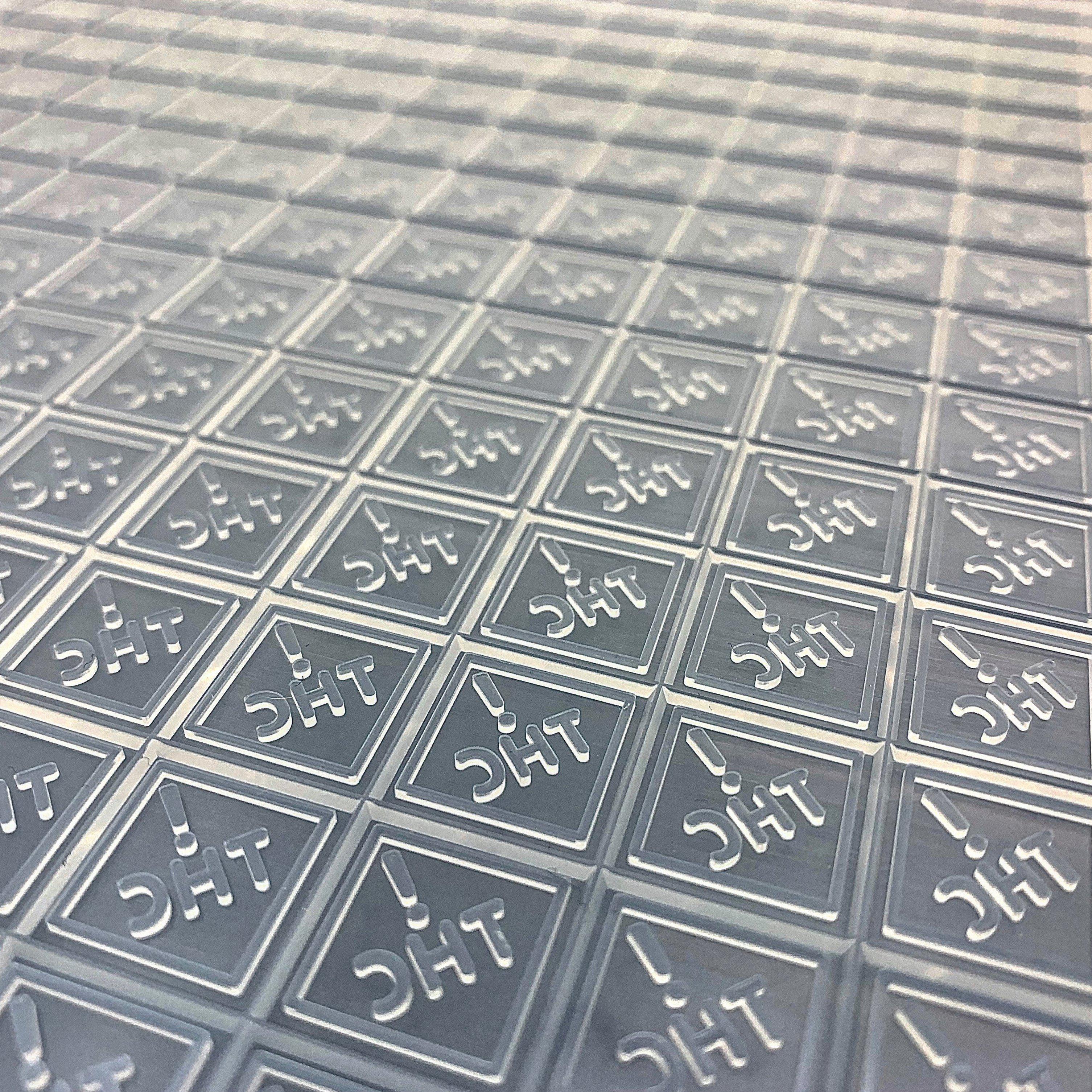 Close up view with detail of 3 mL Square Gummy Slab Mold - CO, OH, NM & FL regulatory Logo Mold - Half Sheet - 1 Large Cavity can be cut into 450 individual gummies. Food grade silicone mold for accurate dosing every time.