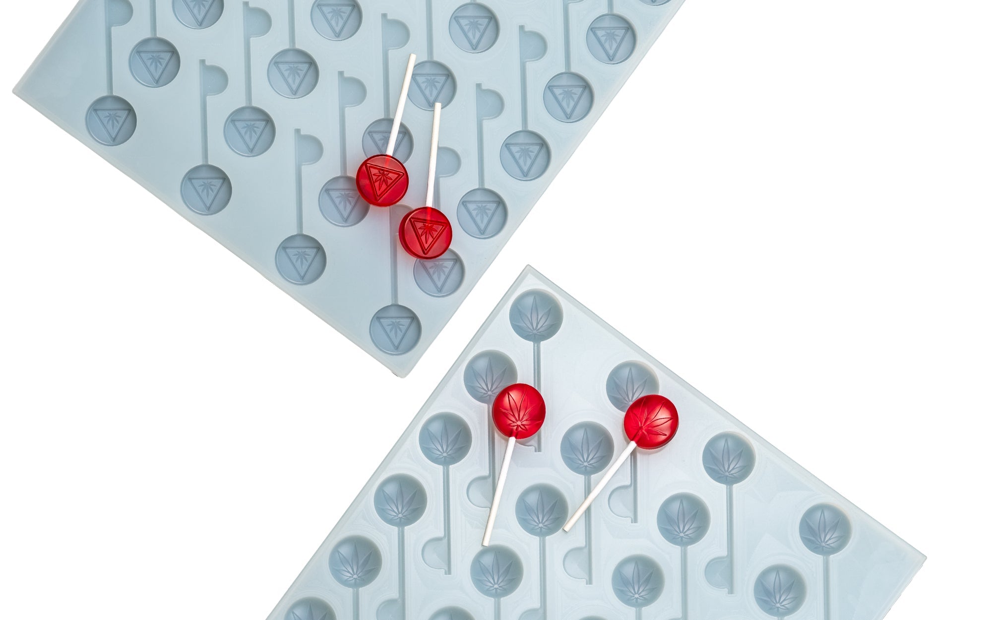 Three red THC-labeled lollipops rest on a white silicone mold with matching THC markings against a blue background.