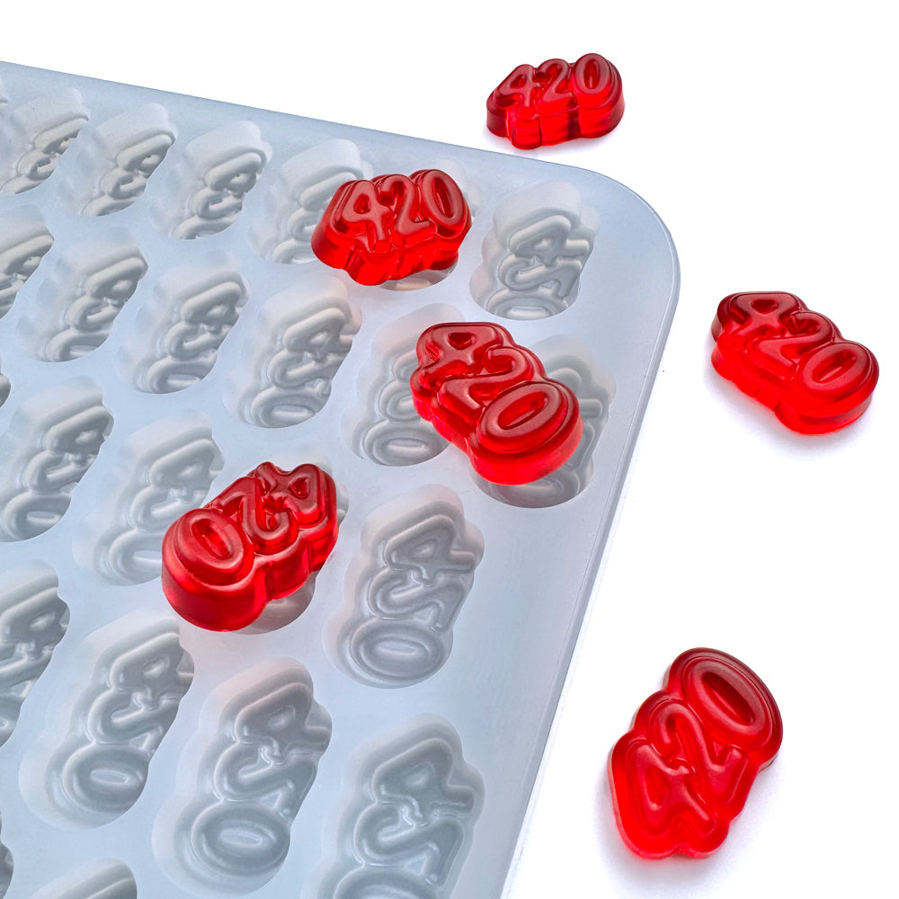 Custom food-grade silicone 420 gummy mold, 4ml cavities designed for clean demolding. Perfect for flood and scrape and shown with red gummies.