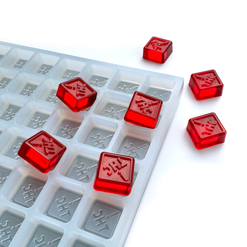 View of a 4 mL Colorado, Ohio, New Mexico, and Florida Compliant Symbol Gummy mold for Edibles great for hand pouring or flood and scrape depositing method. This precision, food grade silicone mold makes accurate doses with a state compliant symbol on top.
