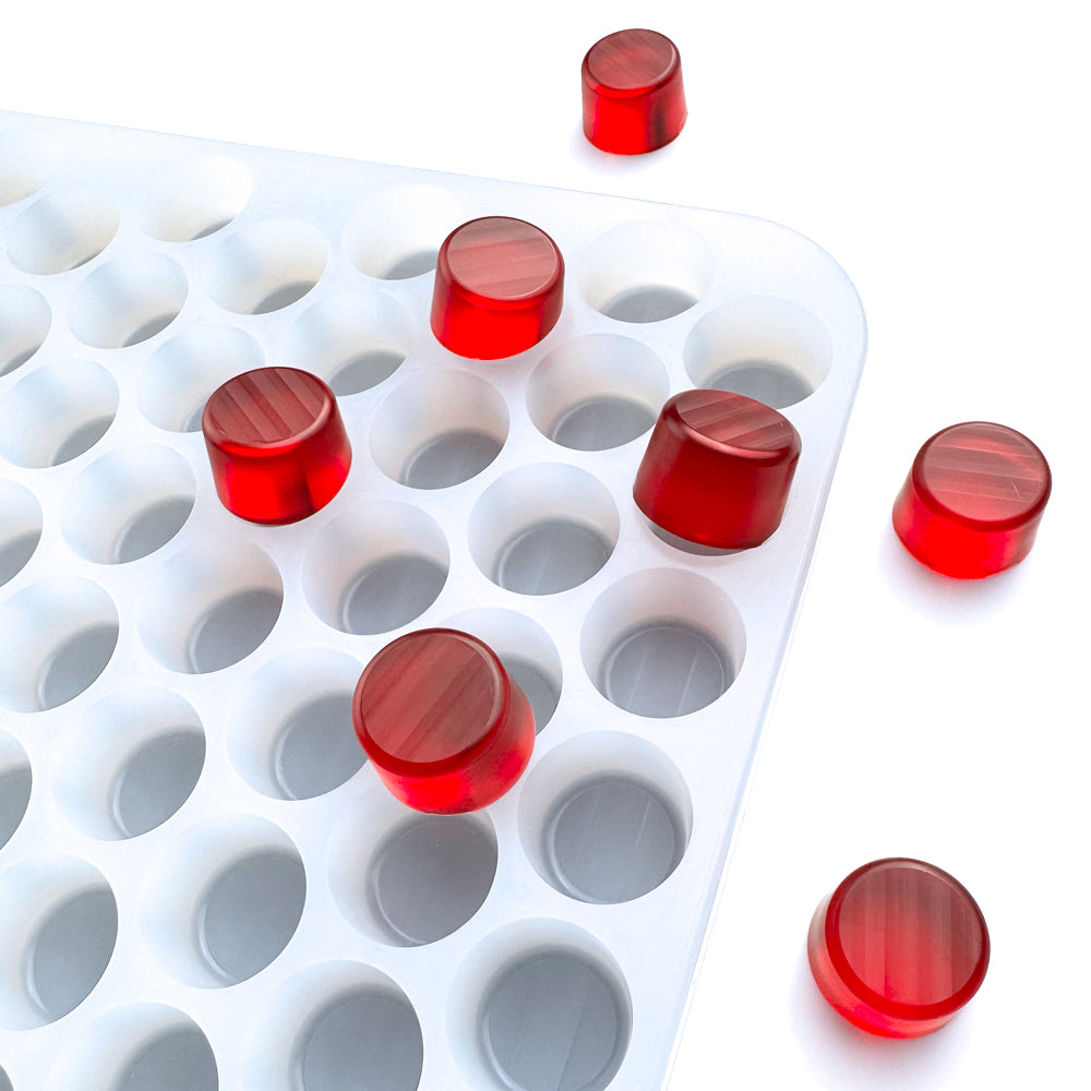 Food-grade custom silicone rolo cylinder gummy mold, 3ml round cavities with flat tops and smooth sides, shown with red gummies, universal depositor compatible.