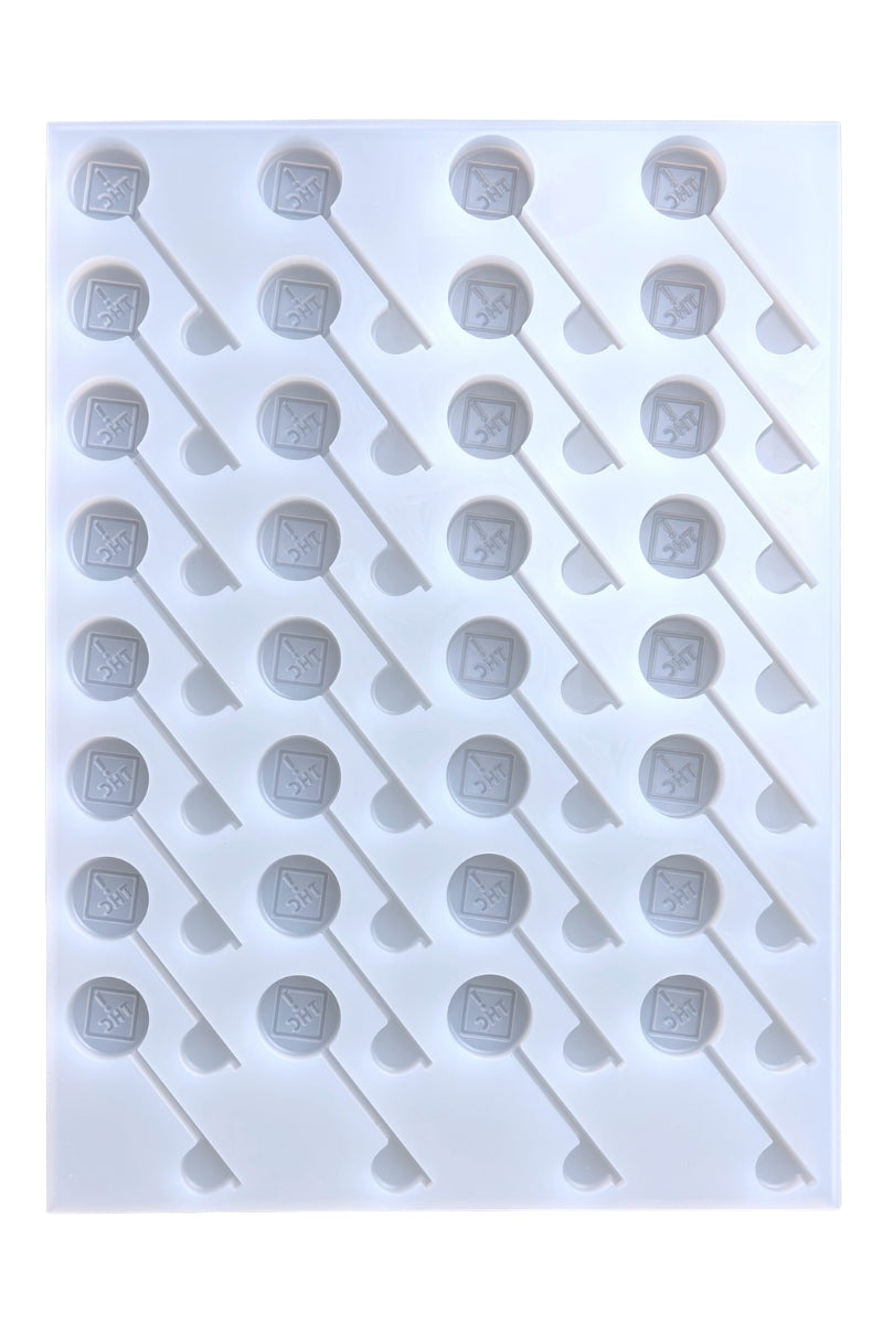 The Vector Molds 6mL CO/OH/NM/FL Sucker-Depositor features 32 hexagonal cavities on sticks, arranged diagonally. Made from professional, food-grade, BPA-free silicone for safe and easy candy crafting.