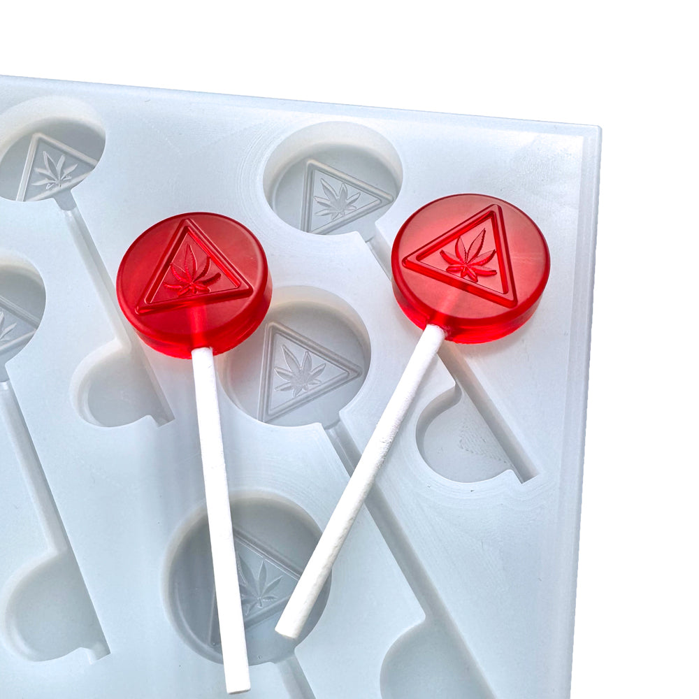 Custom food-grade silicone Sucker mold, 6ml cavities with NJ-compliant logo design, shown with red suckers, compatible with universal depositor machines.