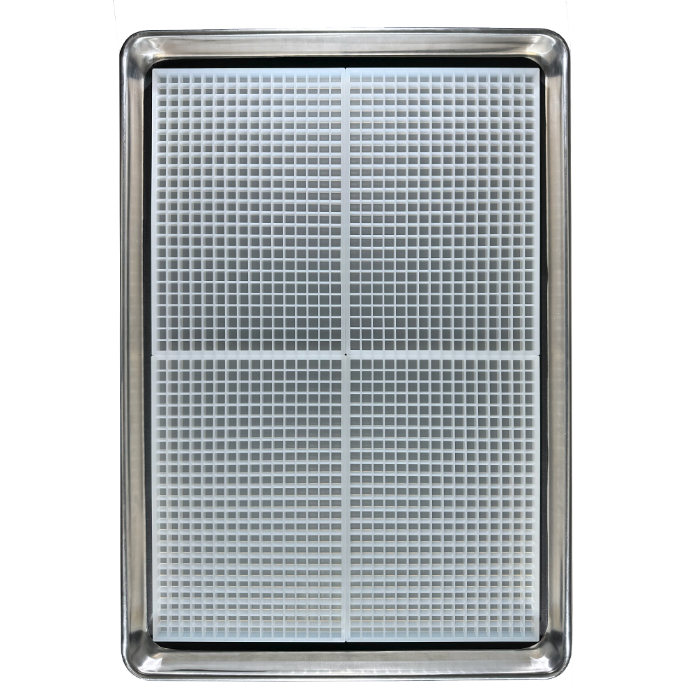 View of 4 molds in a tray of 1mL Cube food grade silicone gummy mold - small but mighty accurate size for accurate doses with 384 cavities per quarter sheet. 4 quarter sheets per industrial sheet pan.