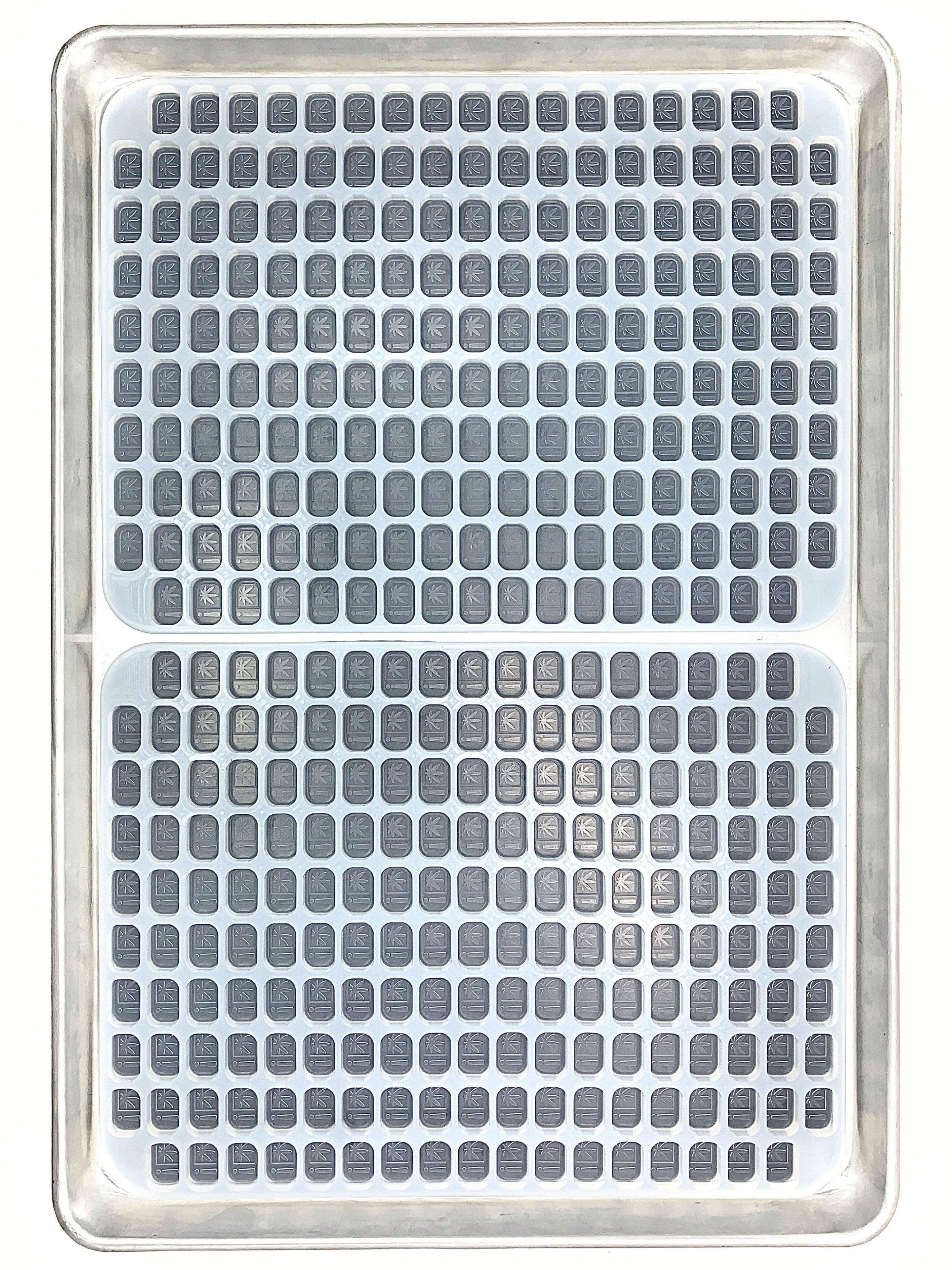 2 molds in Industrial Sheet Pan. 4 mL Oklahoma and Oregon State Compliance symbol Rounded Brick Silicone Mold. Perfect for hand pouring or flood and scrape gummy manufacturing. Precision made for precise dosing. Food grade and oven/dishwasher safe molds.